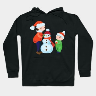 Kids building snowman Hoodie